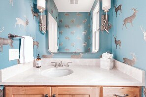 Bathtub, hair dryer, towels
