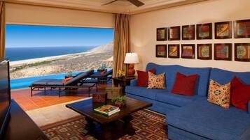 Flatskjerm-TV, peis og kontorer