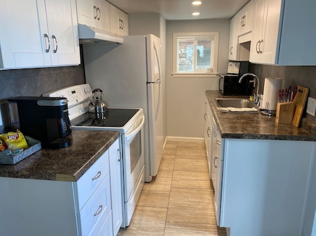Fridge, microwave, oven, stovetop. 1 BDRM apartment - Great Location!