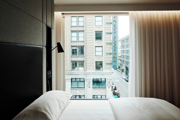 Premium Room, 1 King Bed (View) | Premium bedding, pillowtop beds, in-room safe, desk