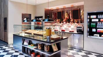 Daily buffet breakfast (USD 22 per person)