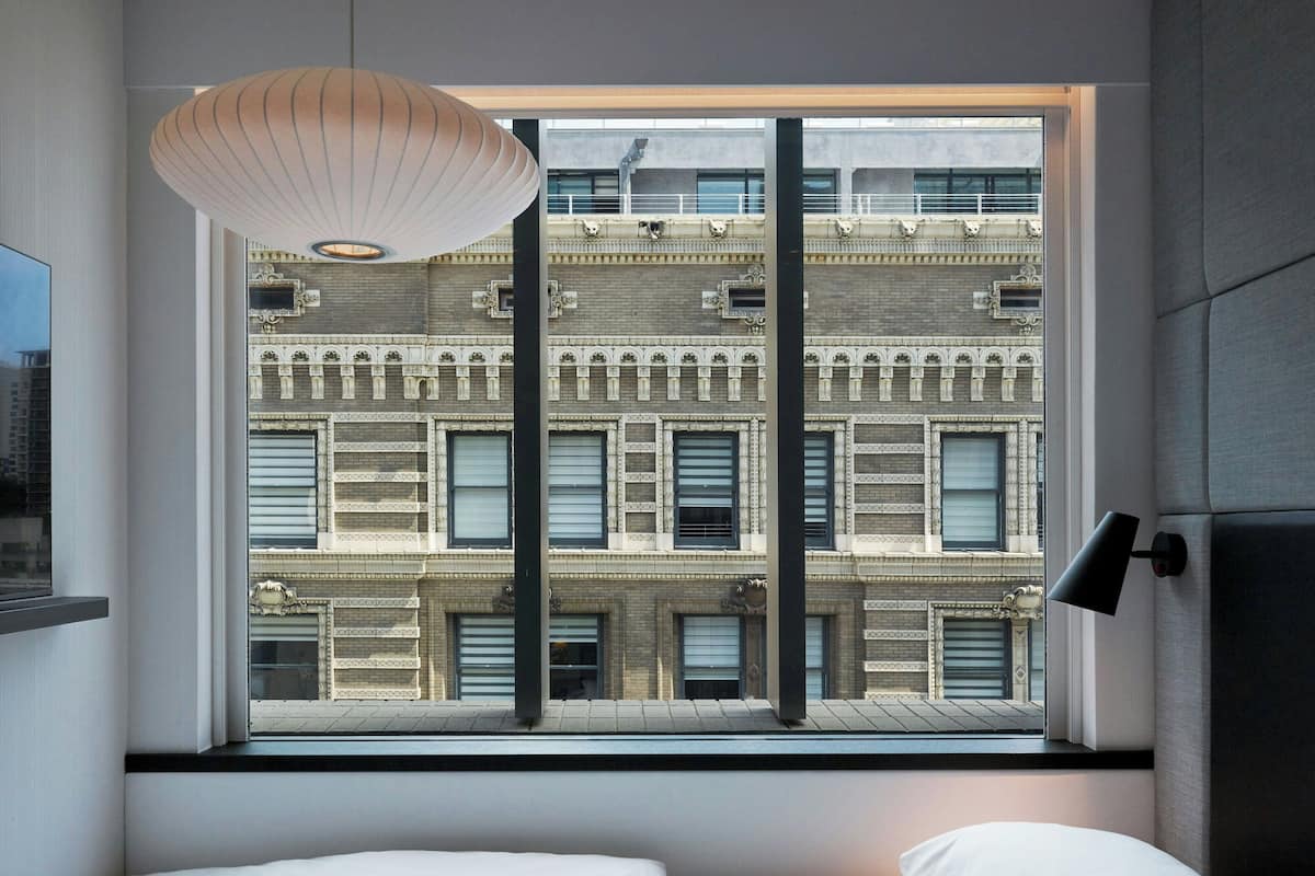 Premium bedding, pillow-top beds, in-room safe, desk