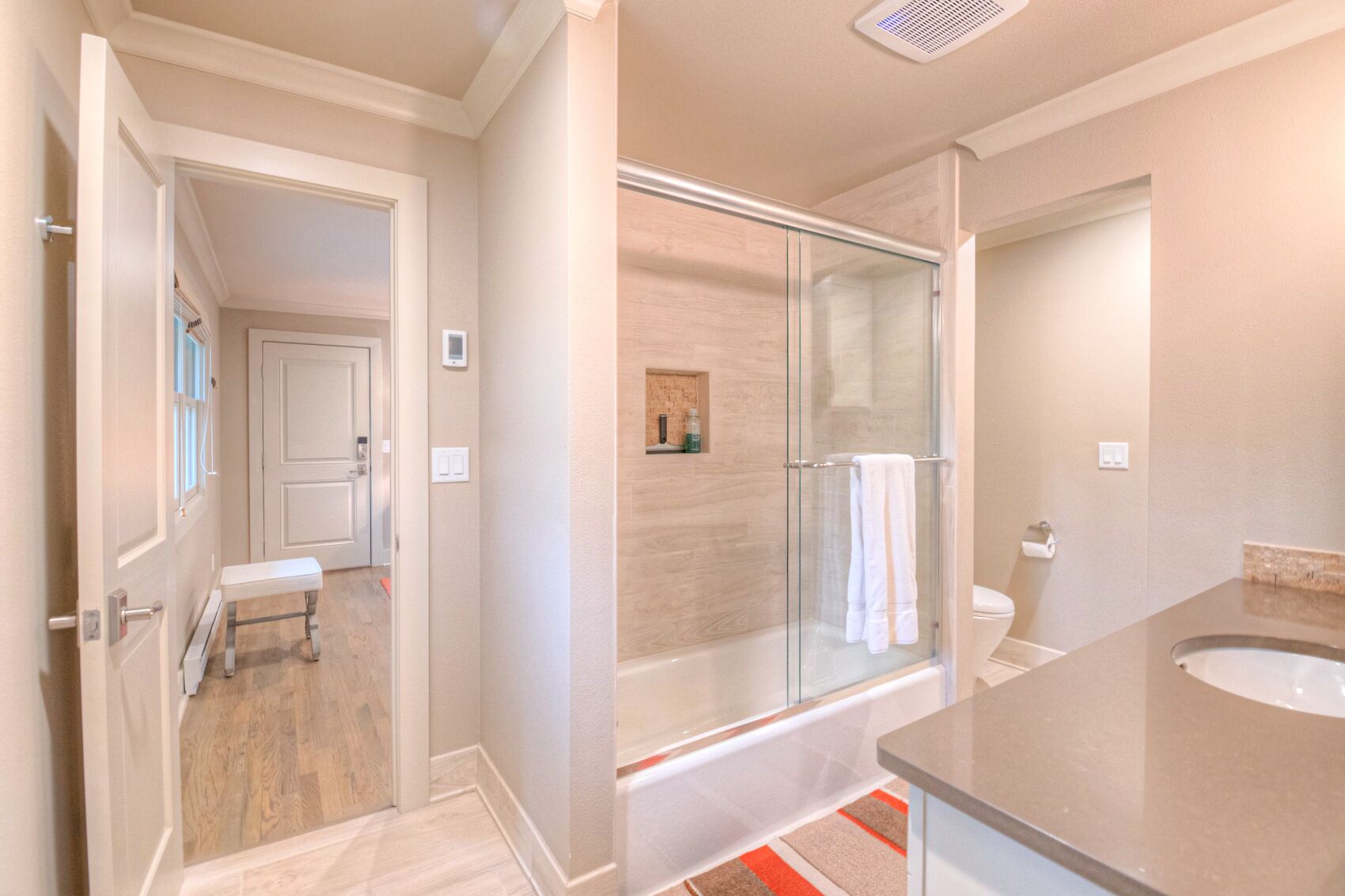 Combined shower/tub, hair dryer, towels, soap