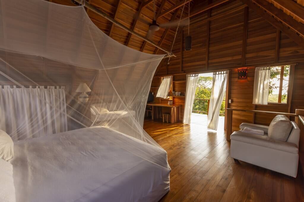 This dreamy balcony entryway directly facing the bed is simple romance
