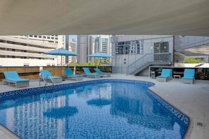 Outdoor pool, open 7:00 AM to 9:00 PM, sun loungers