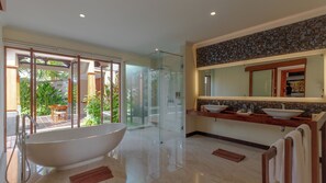 One Bedroom Garden Pool Villa | Bathroom | Free toiletries, hair dryer, bathrobes, slippers - The Grand Villandra Resort (Buleleng)