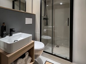 Shower, free toiletries, hair dryer