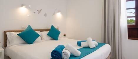 2 bedrooms, blackout curtains, iron/ironing board, free Internet