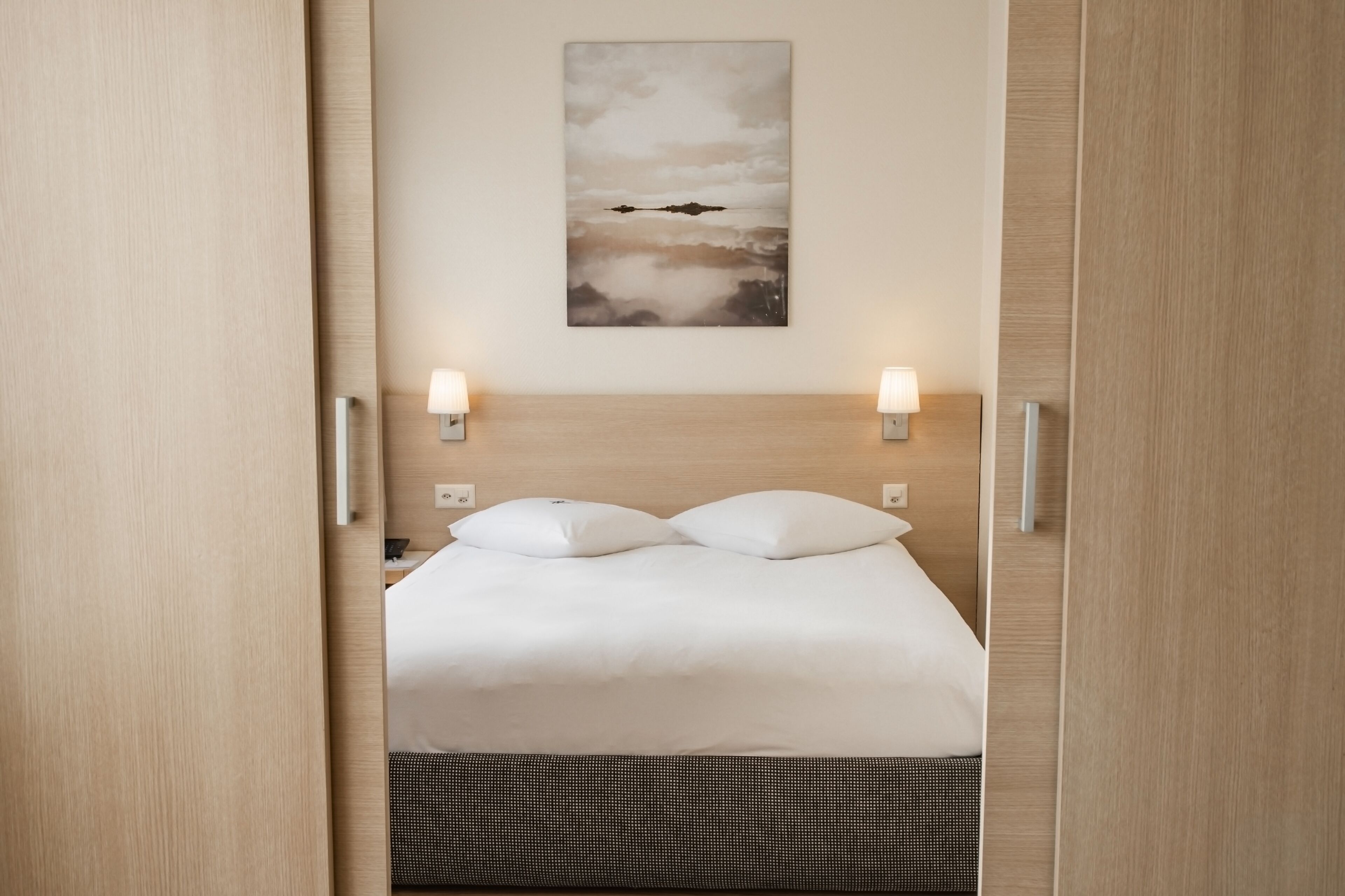 family room | premium bedding, down duvets, in-room safe, individually furnished