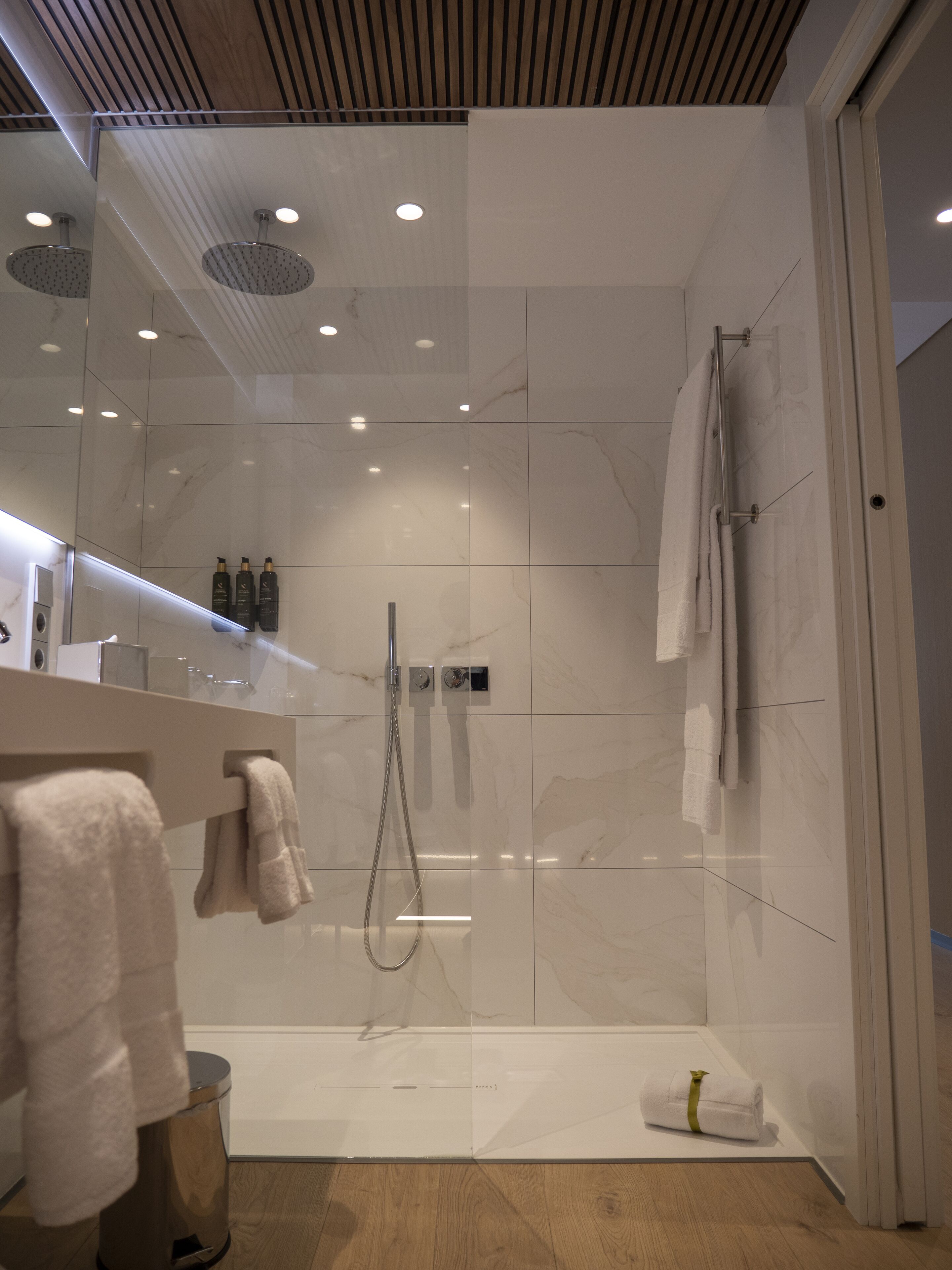 rainfall showerhead, hair dryer, heated floors, towels