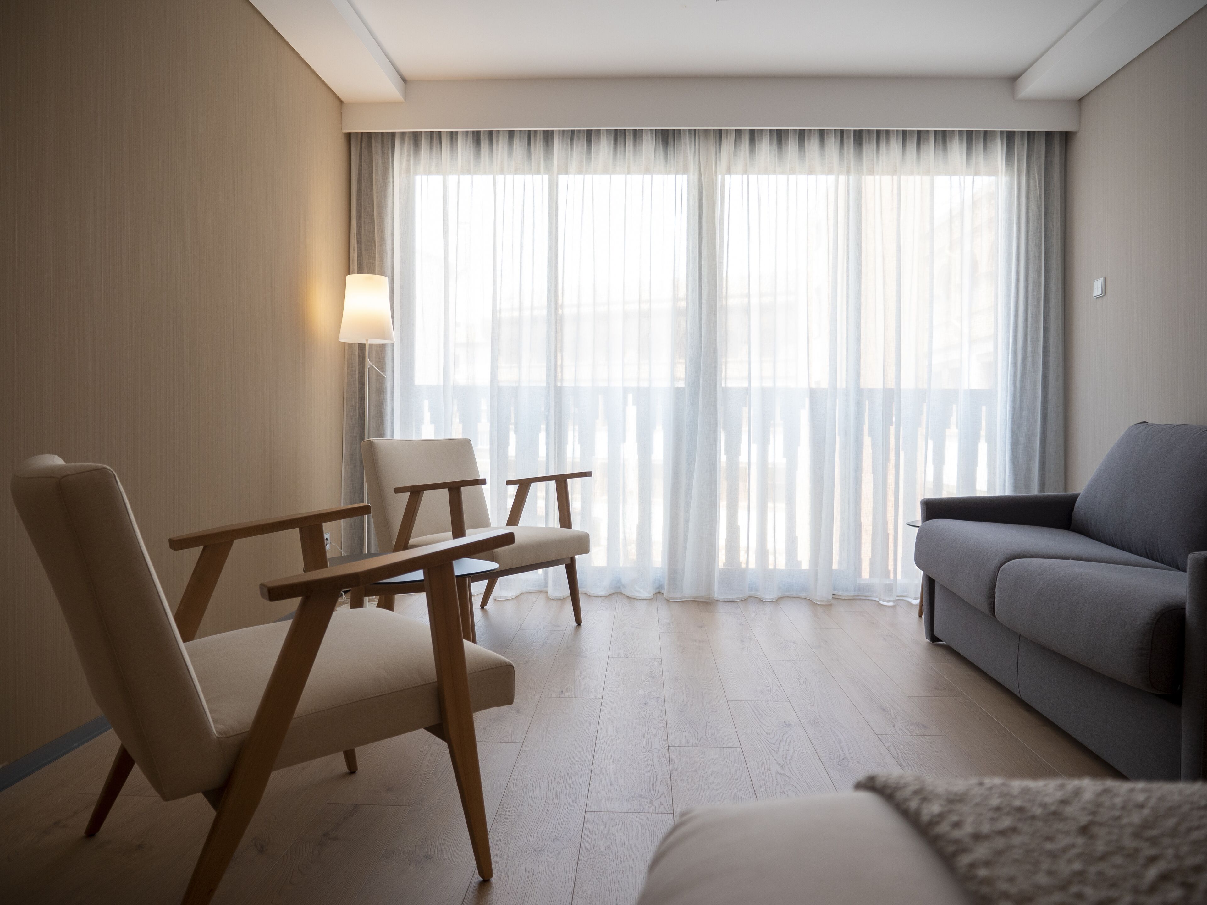 family room | 1 bedroom, down duvets, minibar, in-room safe