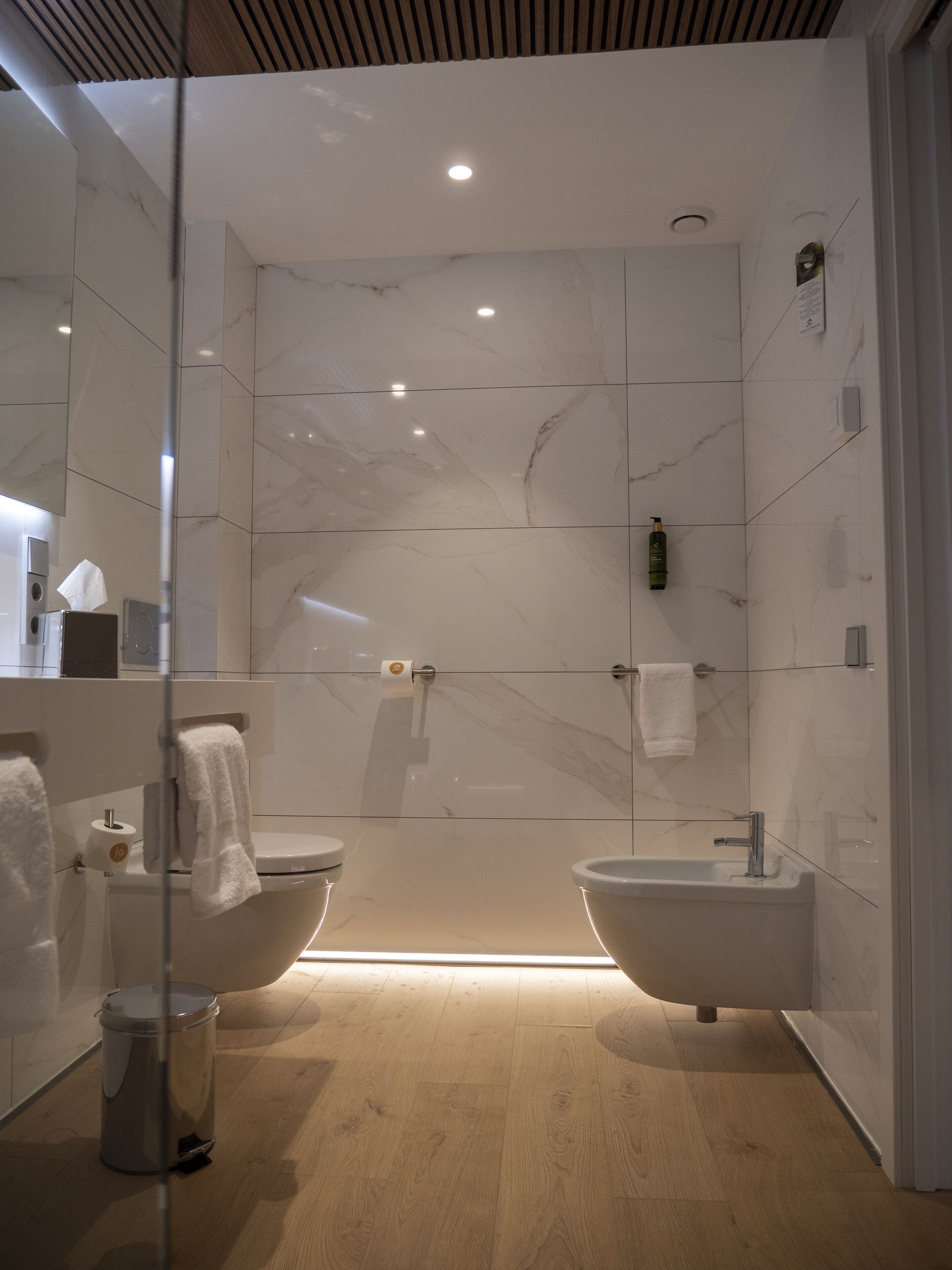 family room | bathroom | rainfall showerhead, hair dryer, heated floors, towels