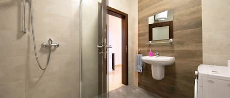 Bathtub, hair dryer, towels