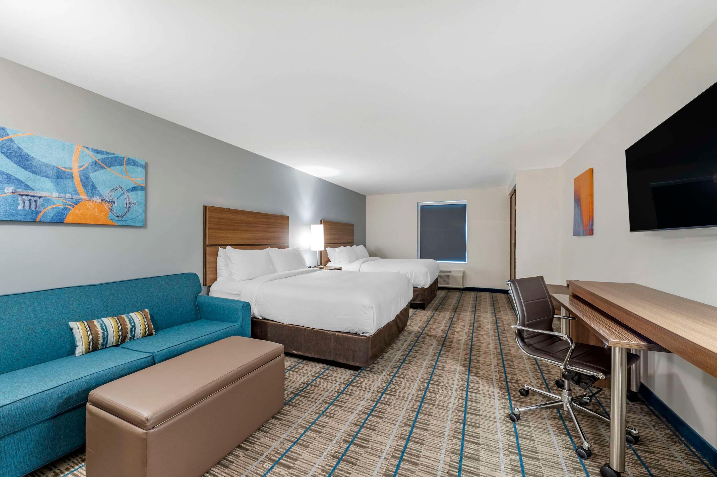 Premium bedding, pillow-top beds, desk, blackout curtains