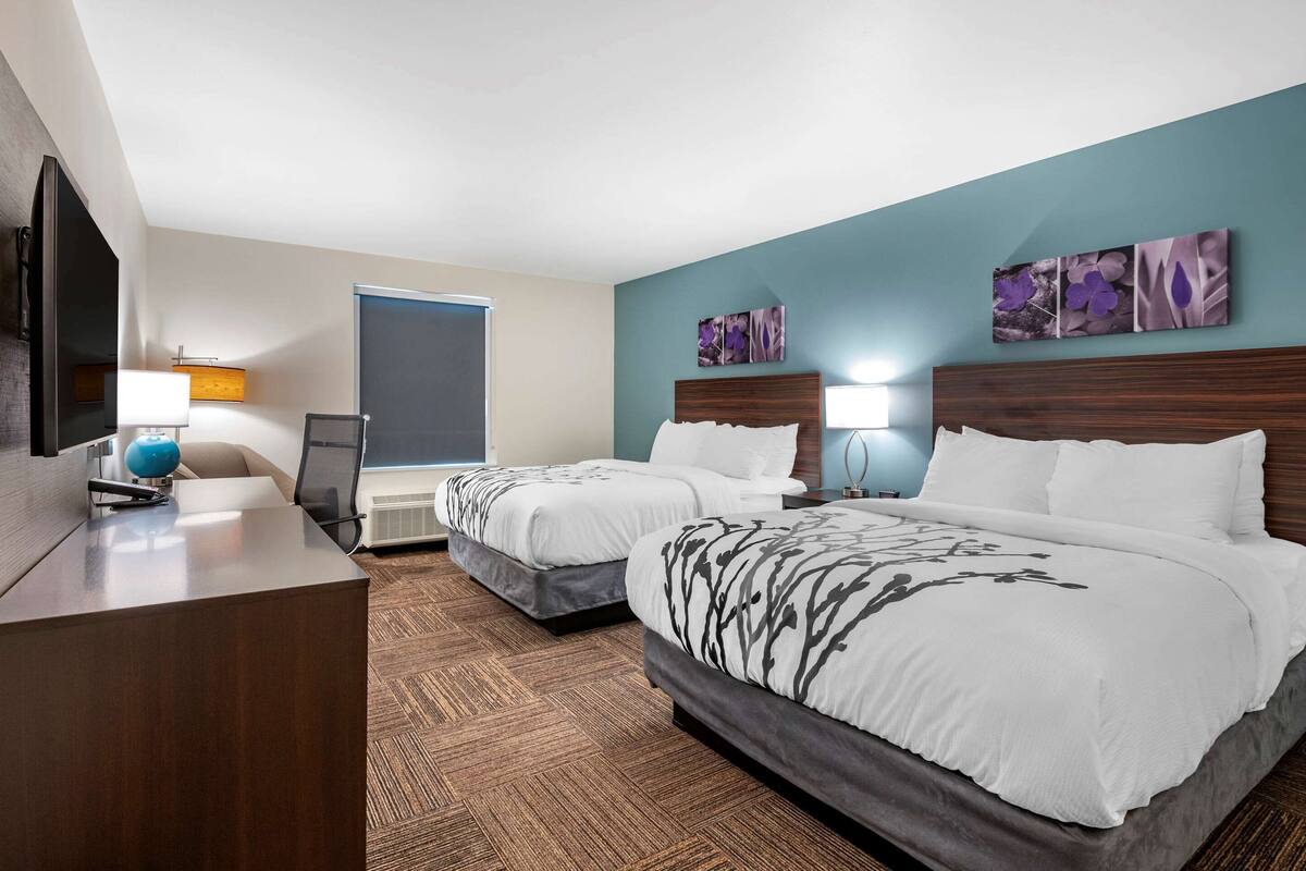 premium bedding, down duvets, pillow-top beds, individually decorated