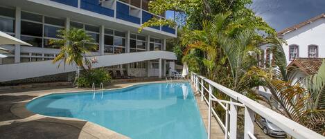 Indoor pool, pool umbrellas, sun loungers