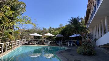 Indoor pool, pool umbrellas, sun loungers