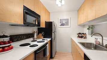 Condo (Sagewood 8) | Private kitchen | Coffee/tea maker, eco-friendly cleaning products, freezer, paper towels