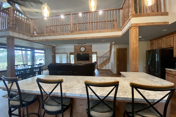looking into the living room; above catwalk