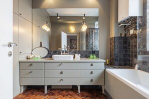 Bathtub, hair dryer, towels