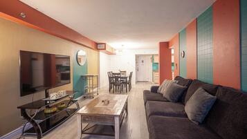 Executive Penthouse, 2 Bedrooms, City View | Living area | Flat-screen TV, DVD player