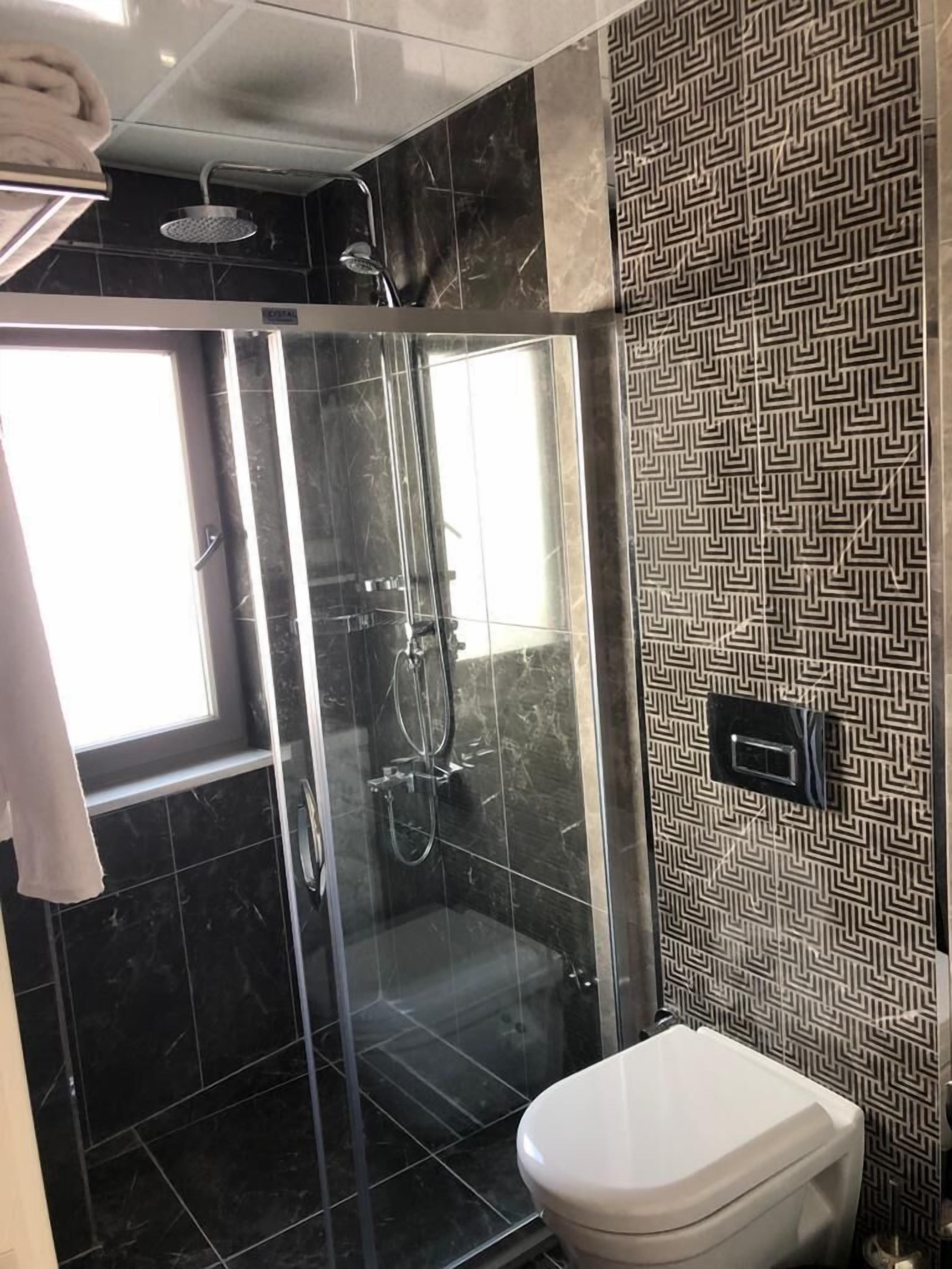 shower, free toiletries, hair dryer, slippers