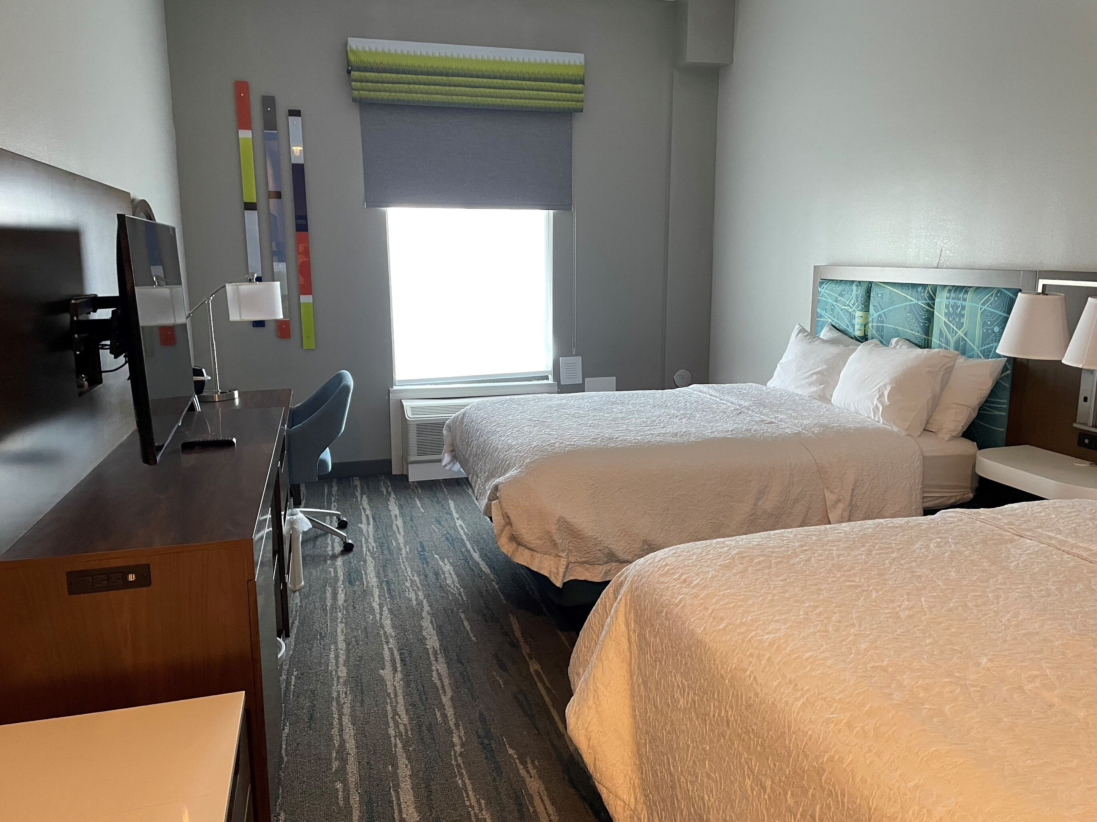 room, 2 queen beds, refrigerator & microwave | premium bedding, pillow-top beds, in-room safe, laptop workspace