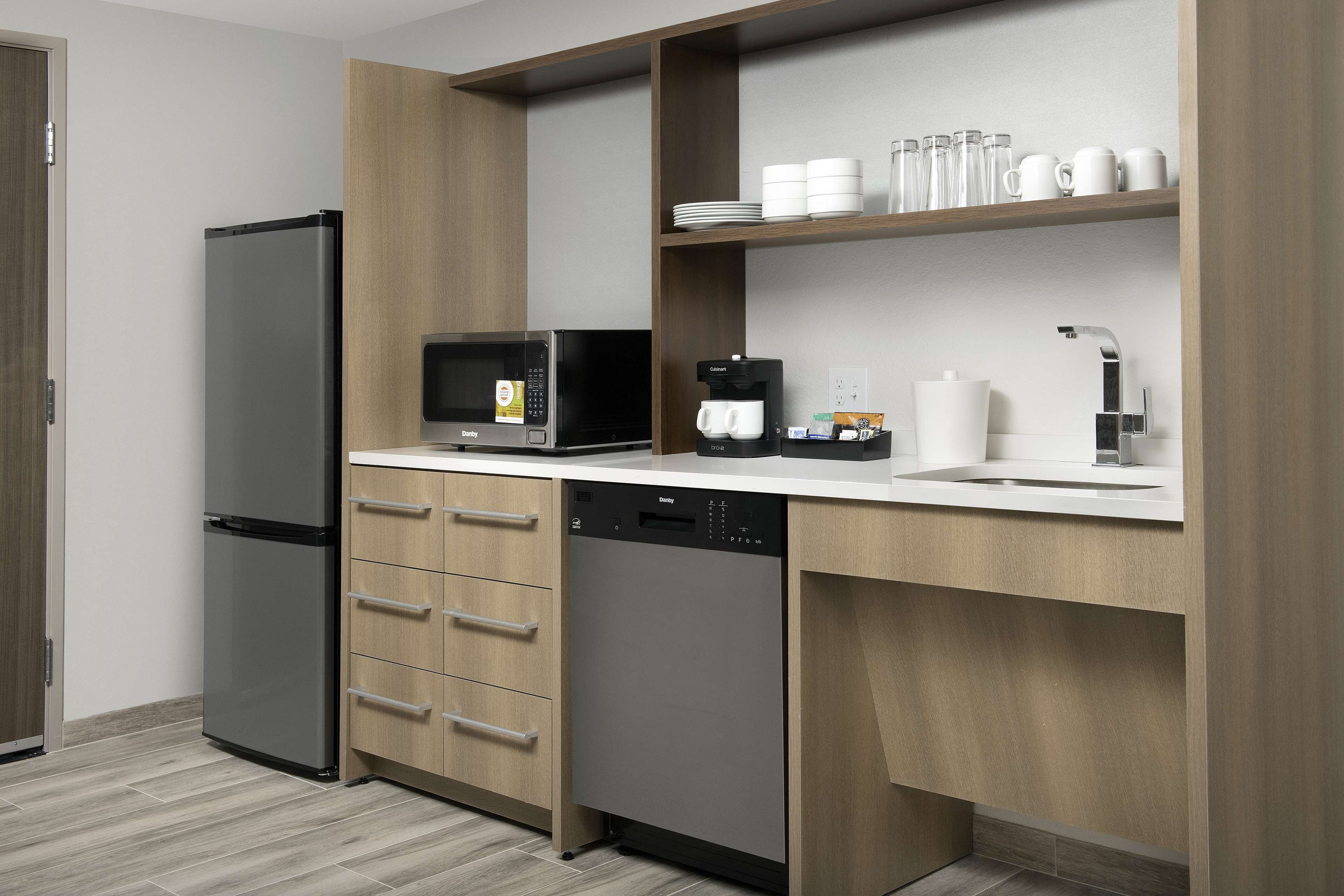 full-sized fridge, microwave, dishwasher, coffee/tea maker