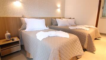 Family Triple Room | Minibar, in-room safe, desk, laptop workspace