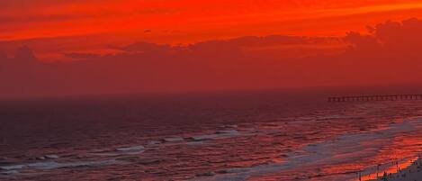 On the beach, sun-loungers