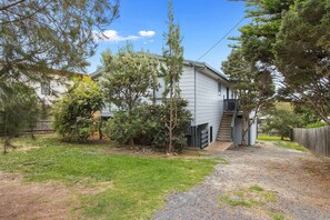 Stroll through the beautifully landscaped grounds to this charming two-story home, featuring a staircase and a, secure setting.