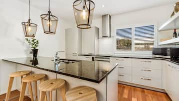 Villa | Private kitchen | Full-sized fridge, microwave, oven, stovetop