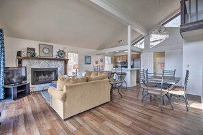 TV, fireplace, books