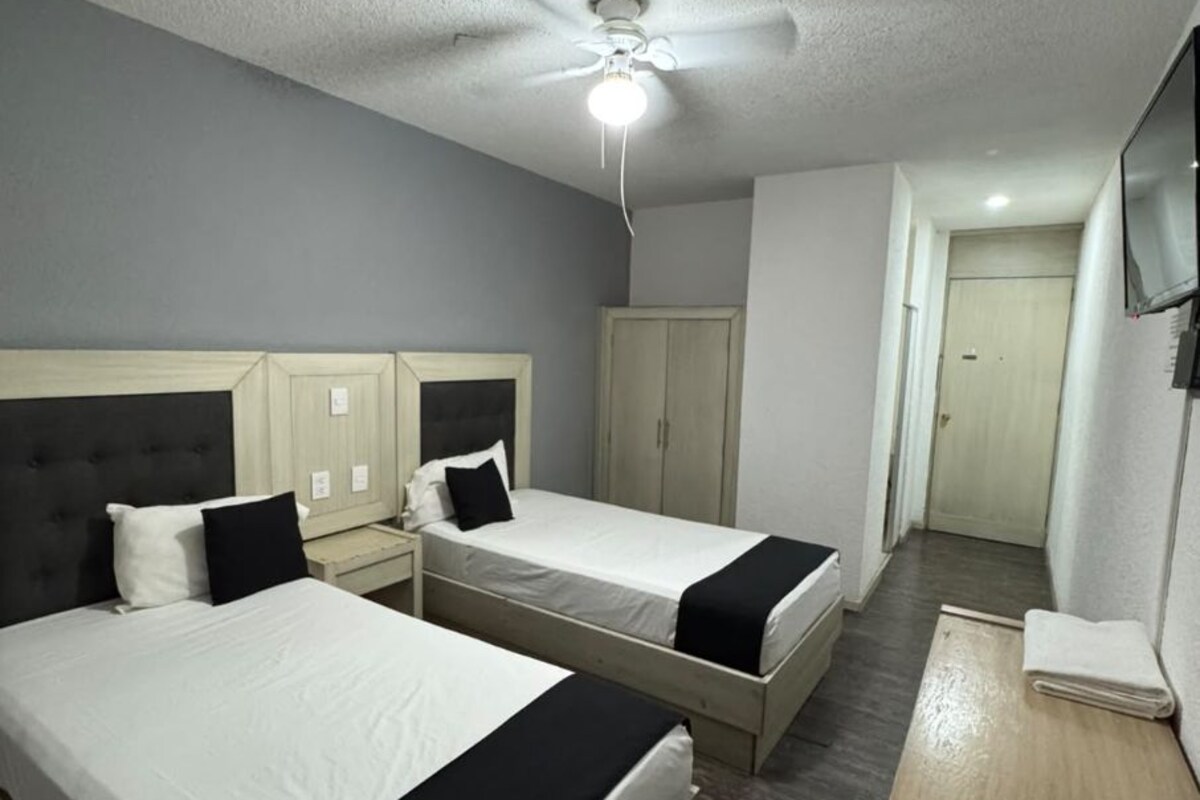 Standard Double or Twin Room | Iron/ironing board (on request), WiFi (free), bed sheets