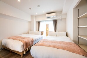 2 bedrooms, free WiFi, bed sheets - Deluxe Apartment 3 Double Beds 1 Single Bed Room for 7 people / Fukuoka Fukuoka (Fukuoka)