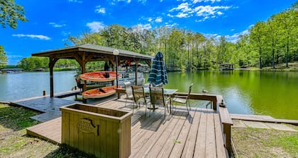 Serene lakefront home with free WiFi, private dock, game room, & central AC