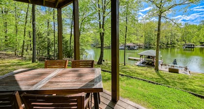 Serene lakefront home with free WiFi, private dock, game room, & central AC