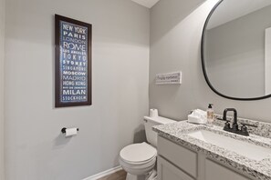 Combined shower/tub, hair dryer, towels, soap