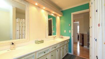 Combined shower/tub, hair dryer, towels, soap