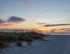 A beach with sand dunes and a sunset. - Beautiful island home, large entrance to beach! Sun deck, ocean view, hot tub (St. Augustine)