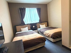 Desk, blackout drapes, free WiFi, bed sheets