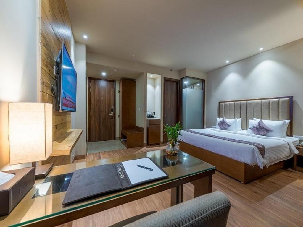 Camas Select Comfort, minibar y caja de seguridad en la habitación 