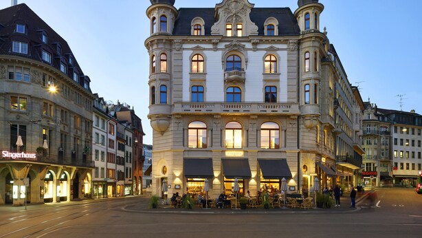A historic building with ornate architecture, featuring multiple windows and a central entrance. - Hotel Märthof Basel (Basel)