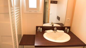 Shower, towels, soap, toilet paper