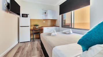 Appartement, 3 chambres, terrasse | 1 chambre, coffres-forts dans les chambres, Wi-Fi gratuit, draps fournis