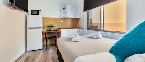 Apartamento, 3 quartos, terraço | 1 quarto, cofres nos quartos, Wi-Fi de cortesia, roupa de cama