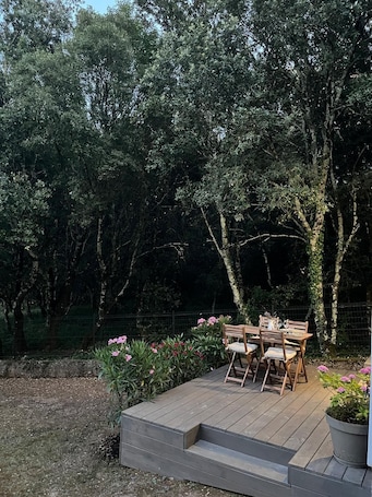 Outdoor dining. Studio with heated pool near the Gorges de l'Ardèche