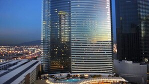 A modern high-rise building with the name 'Vdara' prominently displayed. - Perfect! Lux 1BR Suite at Vdara-15 (Las Vegas)