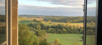 Château on a hill surrounded by its own land overlooking the countryside