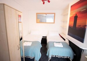 3 bedrooms, desk, iron/ironing board, travel cot